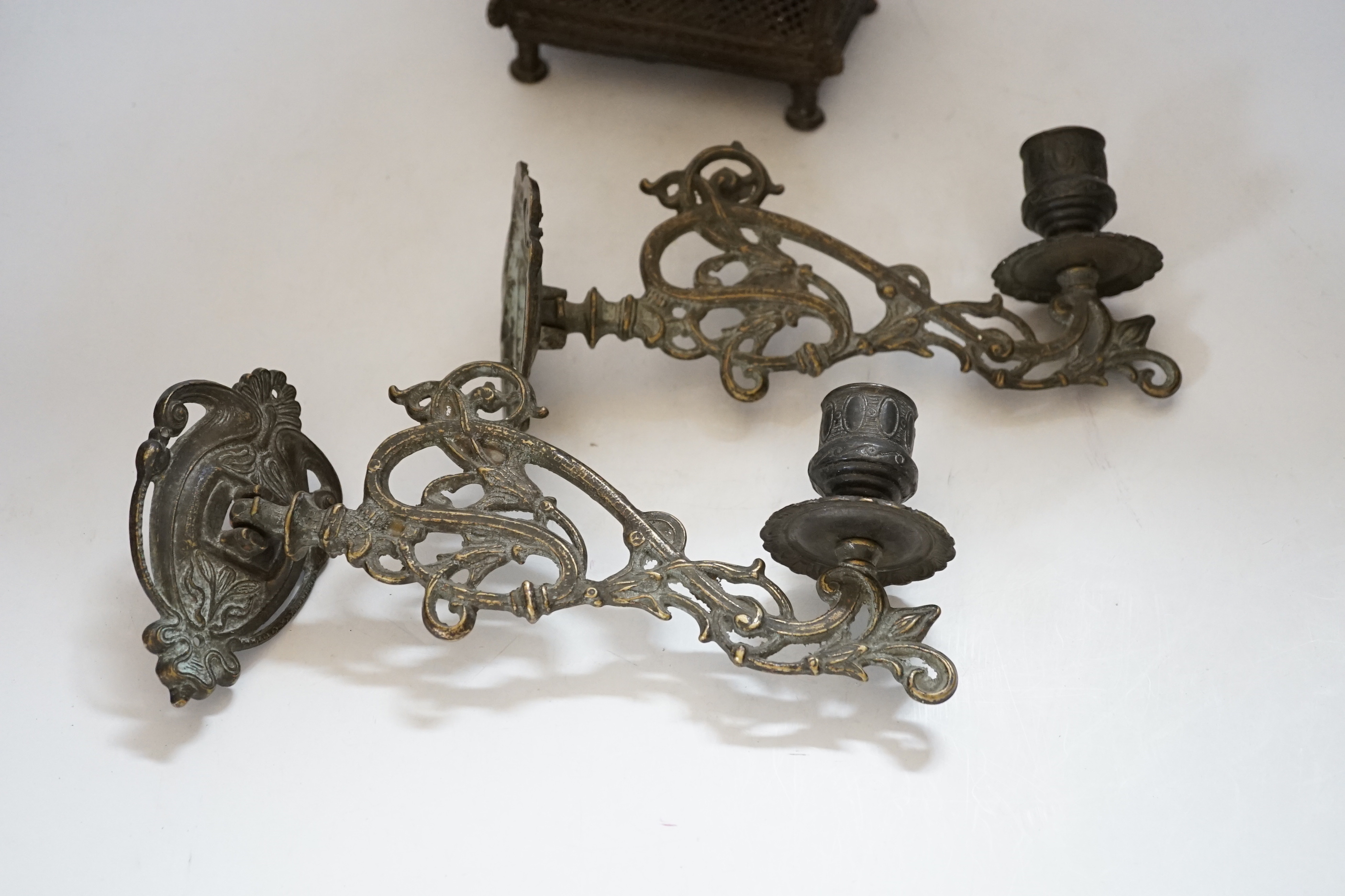 An African Benin style bronze casket and pair of wall sconces, 22cm